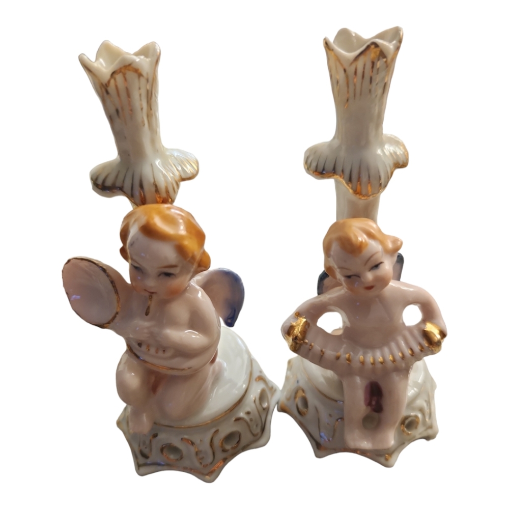 Two Angel Bud Vases. One playing a horn or tuba and the other playing an accordi